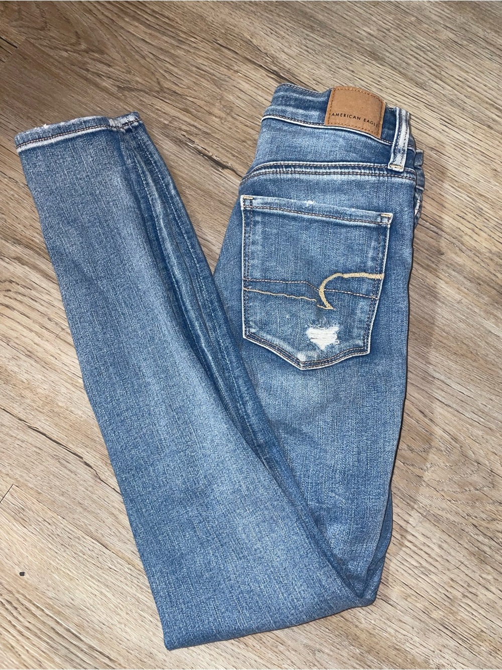 American Eagle Outfitters Mid Blue Skinny Jeans with Back Pocket Detail
